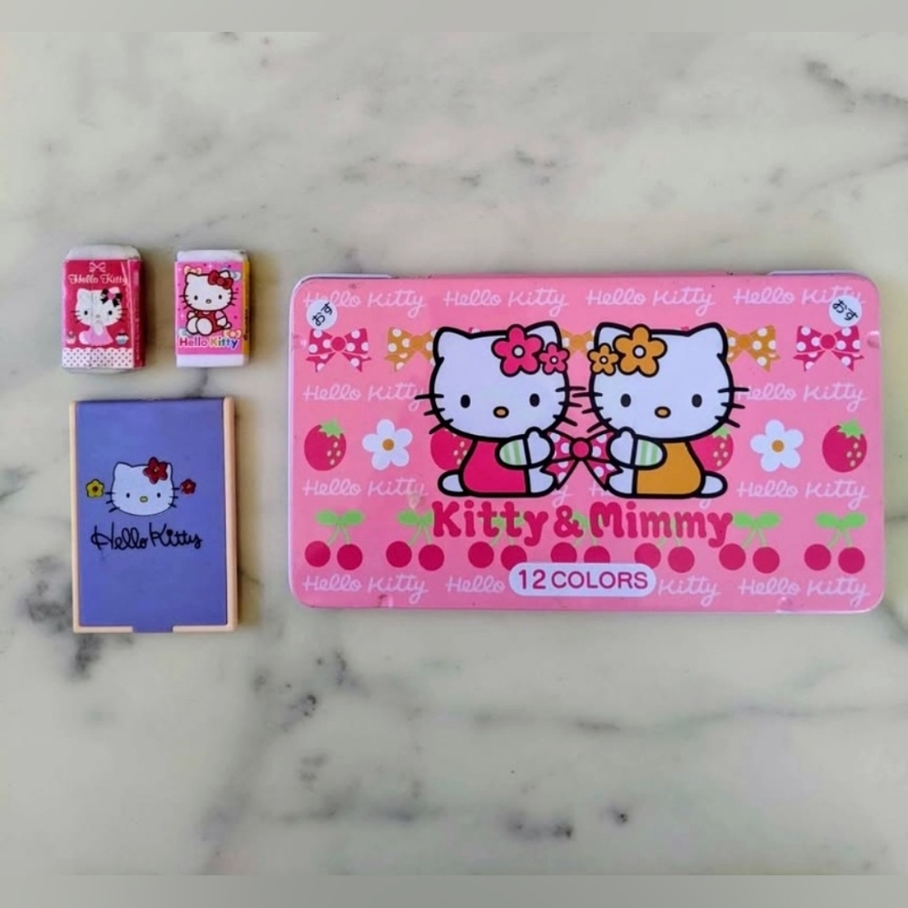 Hello Kitty Pencil Case, 11 Color Pencils, 2 Erasers (New) and a Mini Mirror.